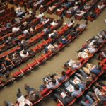 Auditorium - a close look at what to expect from this years Young Movers Conference in Belgium.