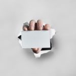 A fist going through a wall and holding a business card is no necessarily a bad thing - learn how that is.