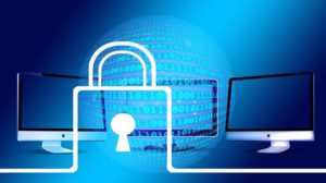 Blue lock in front of a blue background and coding.