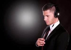 Businessman with headphones on.