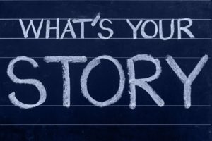 What's Your Story written in chalk on blackboard