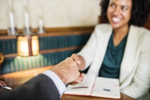 People shaking hands.