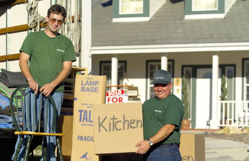 Moving men with boxes