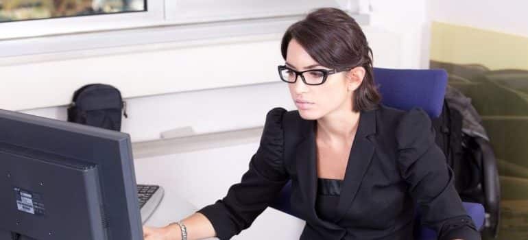 An accountant working on avoiding bookkeeping mistakes.