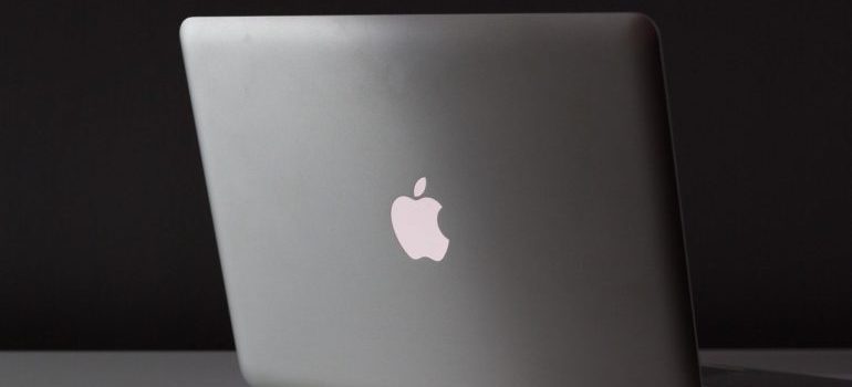 A Macintosh computer, the kind you'd use to run one of the top website mockup tools described.