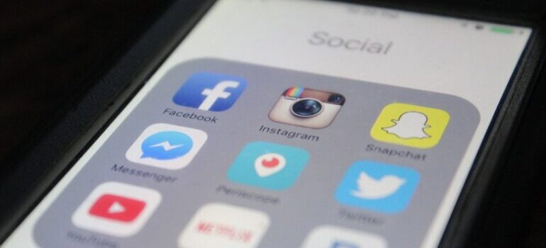 Social media apps on a phone screen.