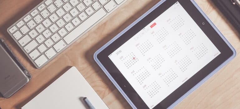 Tablet open to a calendar.