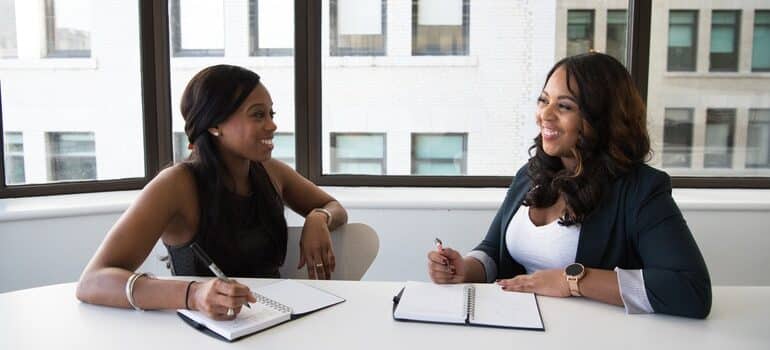 Woman asking Important questions to ask your SEO specialist at a job interview.