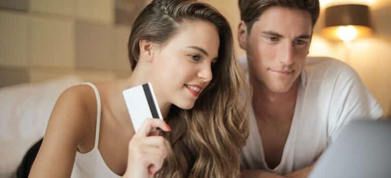 Couple making an online purchase.