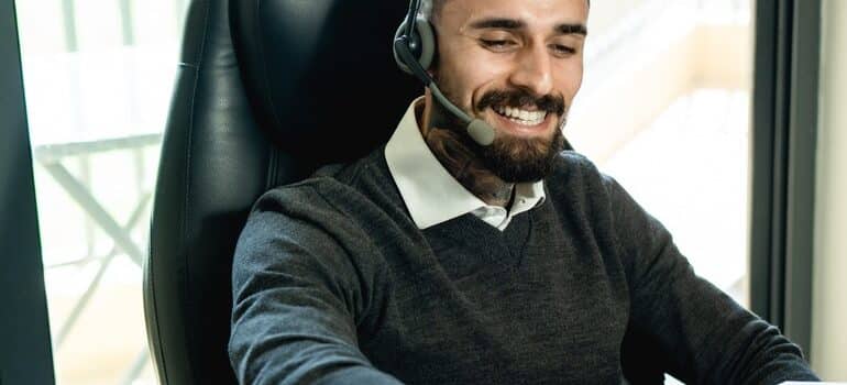 Person offering good service as a way of securing customer loyalty as movers.