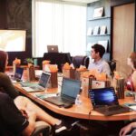 A sales team meeting to discuss the 5 tips for moving company sales teams