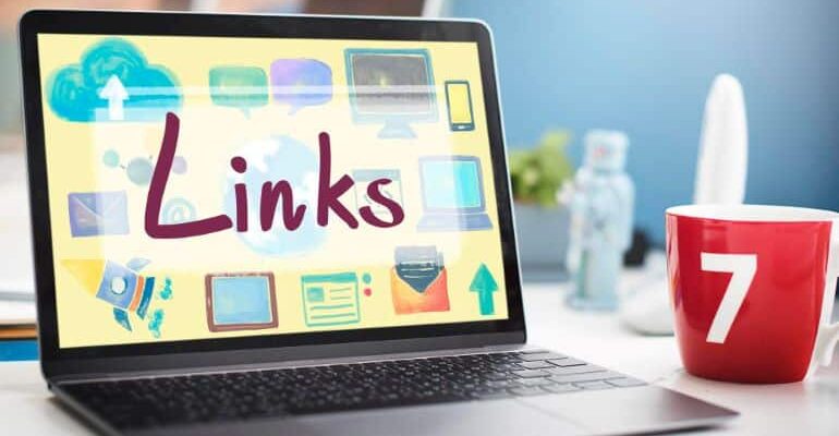 Laptop with Links on screen.