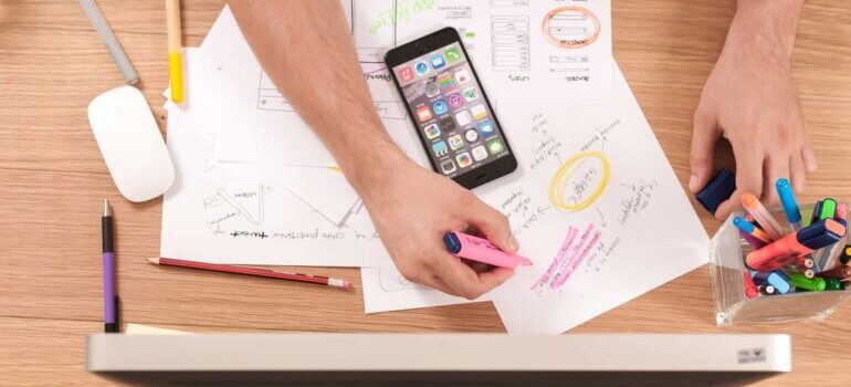 A PR professional creating a PR-strategy on paper.