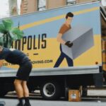 Movers loading a moving truck.