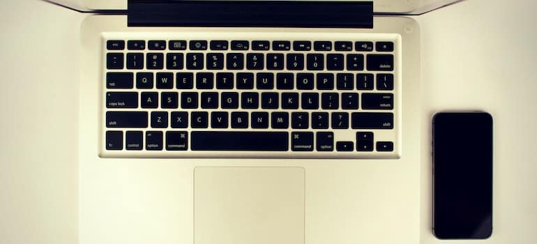 A laptop and a smartphone on a table
