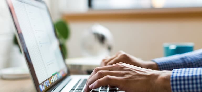 person reading their emails