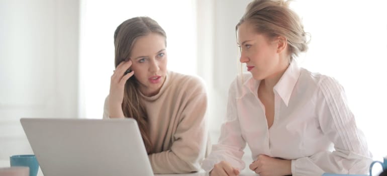Two women thinking