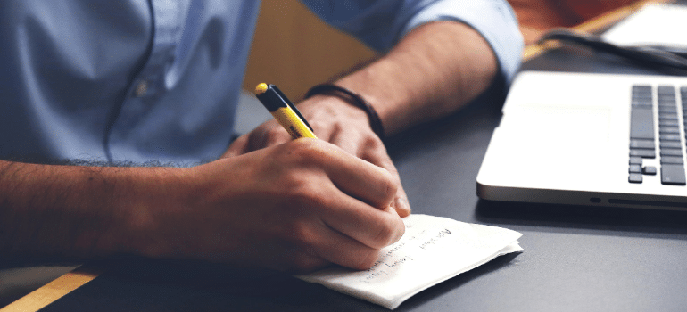 a man writing 