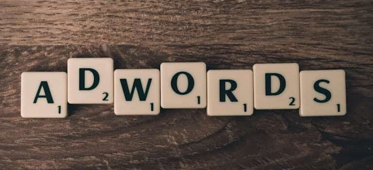 white wooden blocks spelling ADWORDS