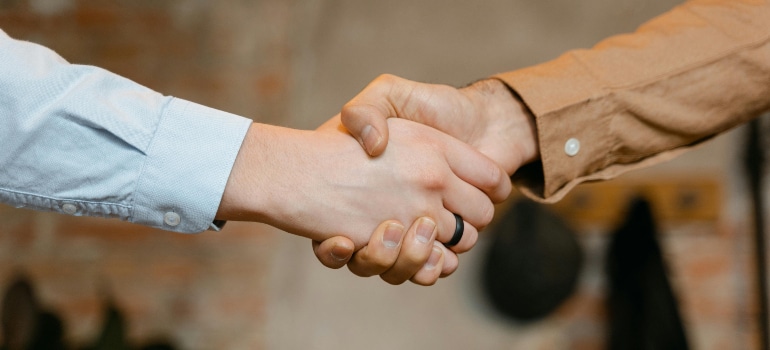 two people shaking hands