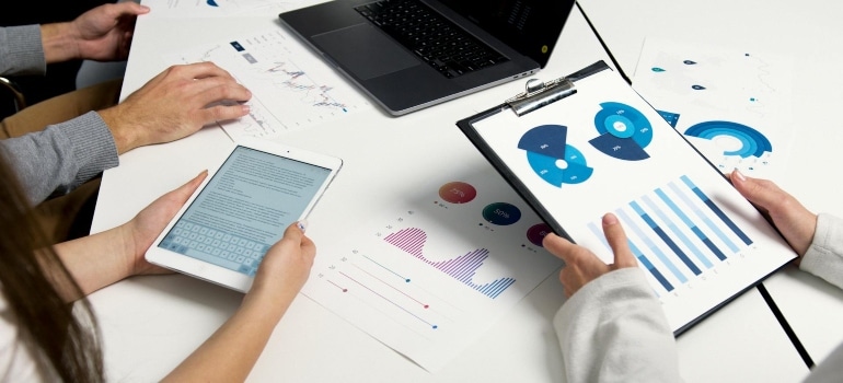 a few people working on some charts 