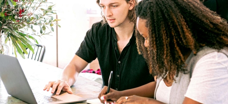 a man and a woman doing some work 
