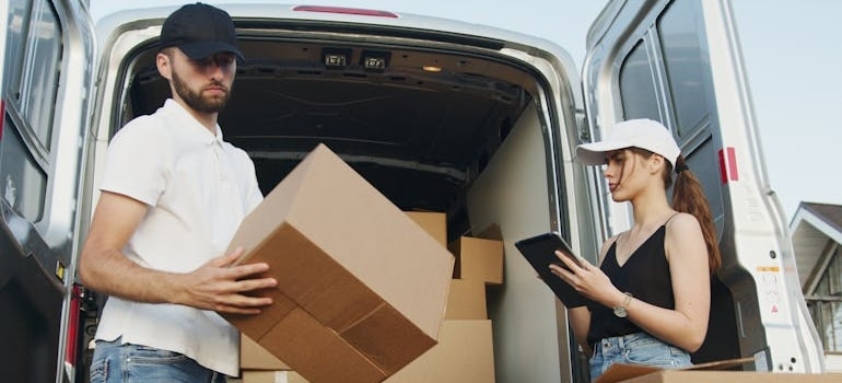 Moving company employees working together