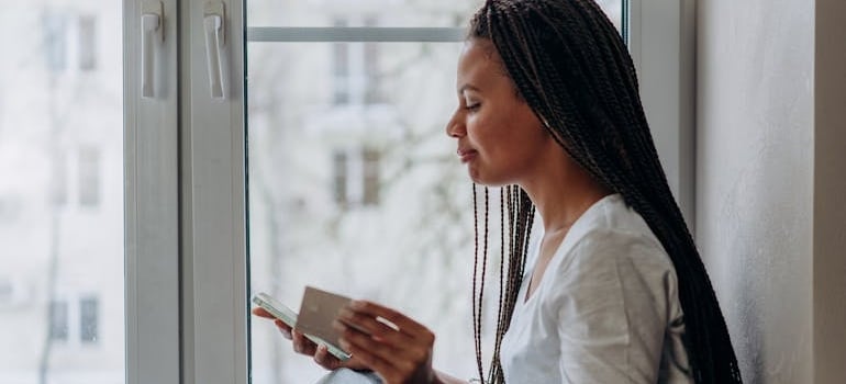 A person using their smartphone to book a service online