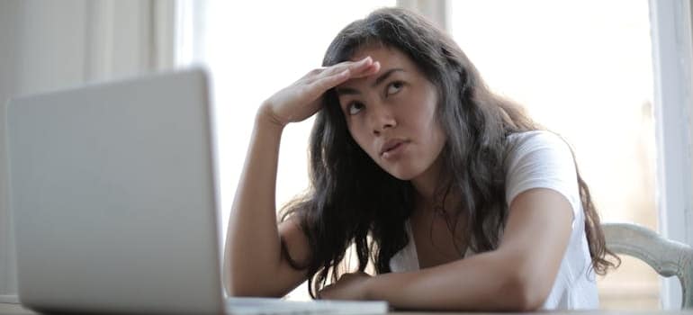 A person frustrated by a long booking process, which is something you need to change to stop losing online bookings