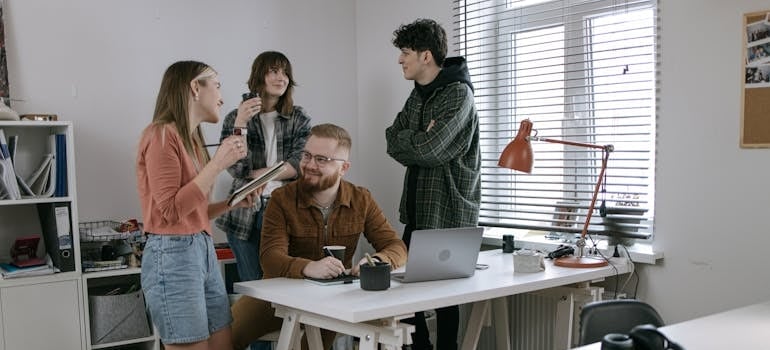 A team of experts discussing content strategies that successful moving companies use