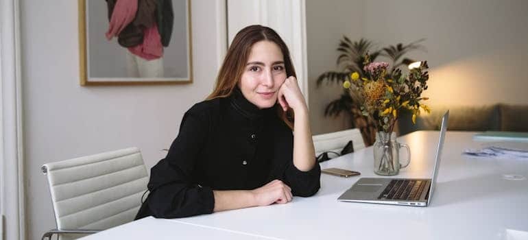 A person in front of a laptop