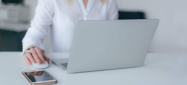 A person doing online research on customer behavior to address the question: Is long-term customer loyalty possible in the moving business?