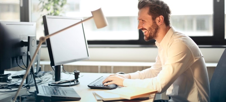 a man doing some computer work 