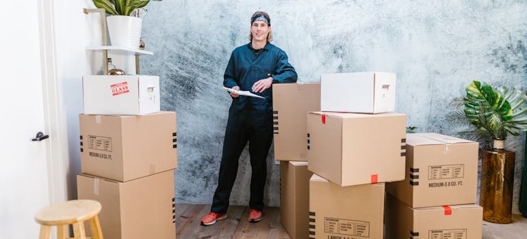 A moving company employee making a list of items they will move