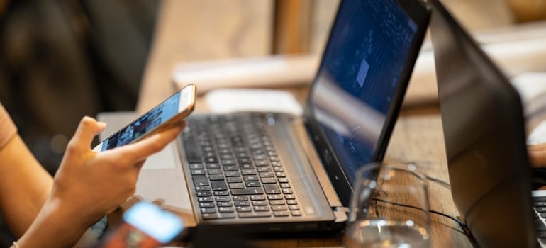 a woman holding a phone 