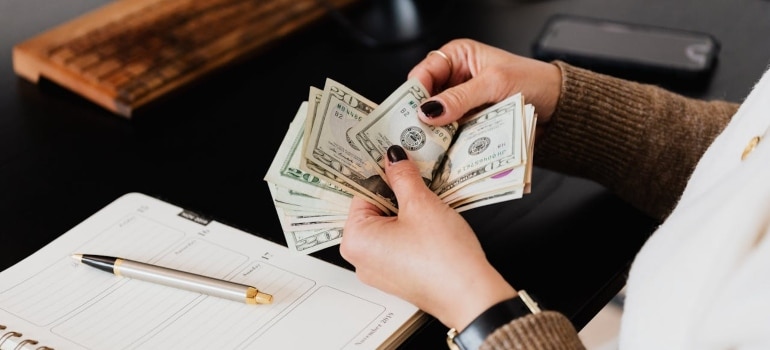 a woman counting money 