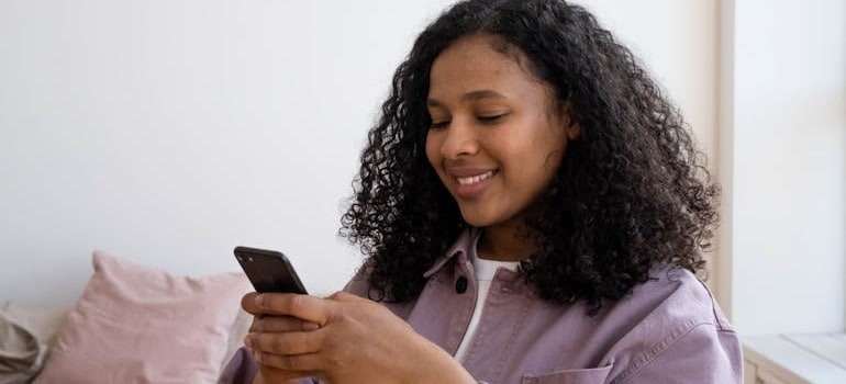 A person reading getting information about their move, which is one of the advice on how to handle nervous clients