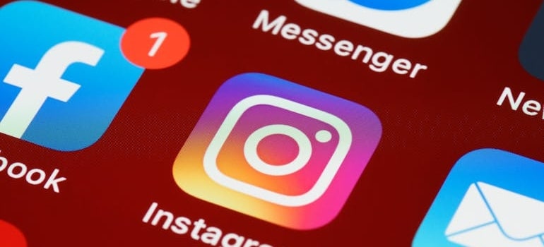 Social media app icons on a smartphone screen