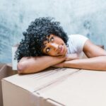 A person thinking about leaving an online review after the move