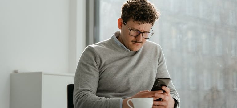 A person searching for moving companies