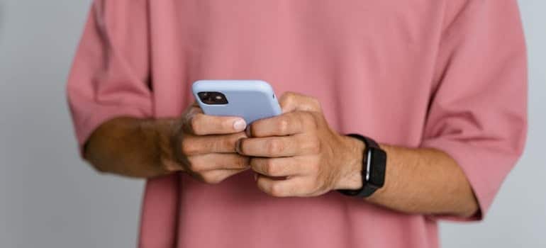 A person reading an SMS
