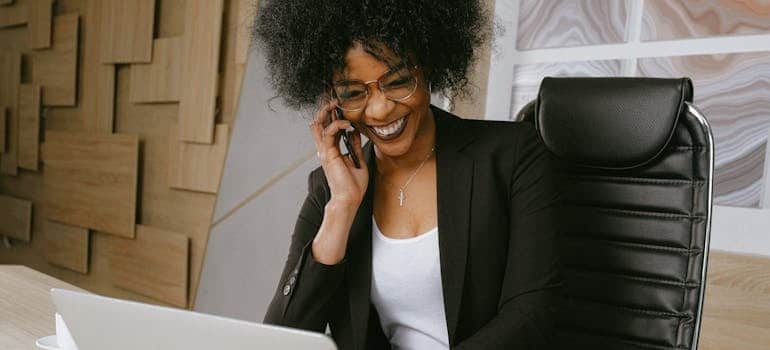 A person calling customers to close the deal after securing a fluent lead flow