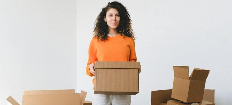 A person packing boxes before a relocation