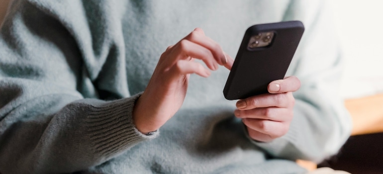 A person holding a phone.