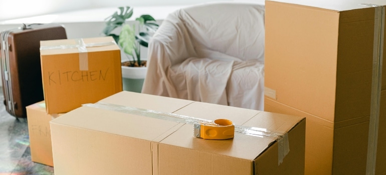 A living room full of boxes.