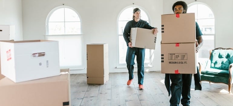 Employees of a moving company that analyzes marketing KPIs for moving companies and uses the insights for improvement