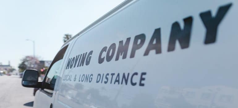 A van of a moving company that uses podcast advertising