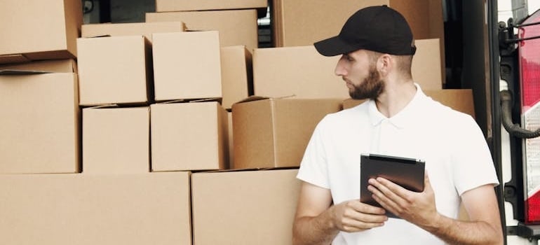An employee of a company using new tools after the end of moving season