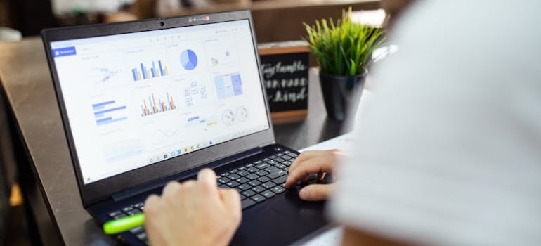 A person checking charts after learning how to measure GBP performance