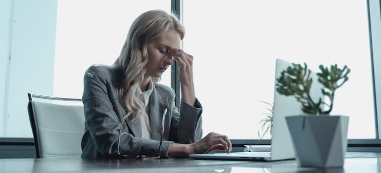 A person feeling stressed after choosing a digital marketing agency that delivers bad results